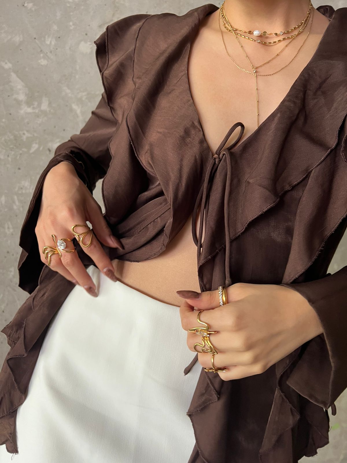 TOP CON MOÑO AL FRENTE Y TIRANTES